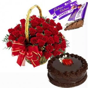 Basket Of Red Flowers And Cake